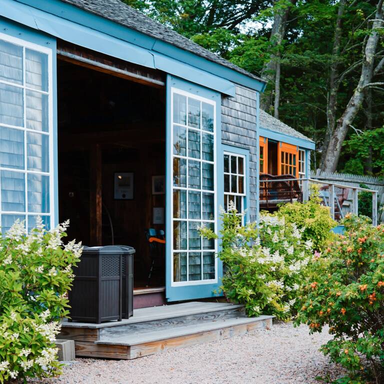 Vintage village home design with new modern windows